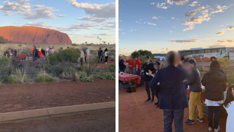エアーズロックのサンセット鑑賞会場に集まる他ツアー参加者と乾杯の様子