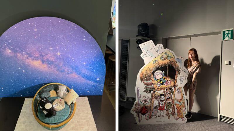水木しげる作品のぬいぐるみを置ける撮影台とDOME1内の妖怪夏祭り看板で撮影する筆者
